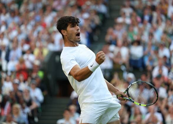 4th July 2025; All England Lawn Tennis and Croquet Club, London, England; Wimbledon Tennis Tournament, Day 5; Carlos Alcaraz (ESP) celebrates towards the Centre Court crowd after gaining a vital game against Jan-Lennard Struff (GER)  ActionPlus12809164 JohnxPatrickxFletcher