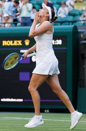 Belgian Elise Mertens celebrates after winning a tennis match between Belgian Mertens and Ukrainian Svitolina, in the third round of the women s singles at the 2025 Wimbledon grand slam tournament, Friday 04 July 2025 at the All England Tennis Club, in South-West London, Britain. BENOITxDOPPAGNE  x128434773x
