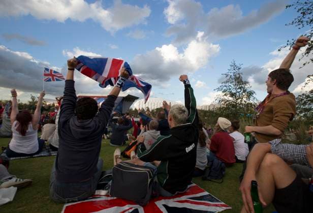 August 2, 2012 - London, England, United Kingdom - Great Britain fans watch games on a giant LED screens during Summer Olympics 2012. Copyright: xDanxAndersonx