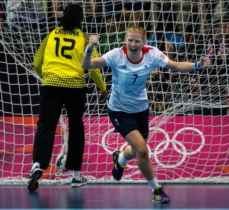 August 2, 2012 - London, England, United Kingdom - Great Britain s ALLISON PINEAU scores on Angola Goalkeeper CRISTINA DIREITO. Great Britain women s handball team suffered a 31-25 defeat against Angola that brings an end to their slim hopes of making it out of Group A during Summer Olympics 2012. Copyright: xDanxAndersonx