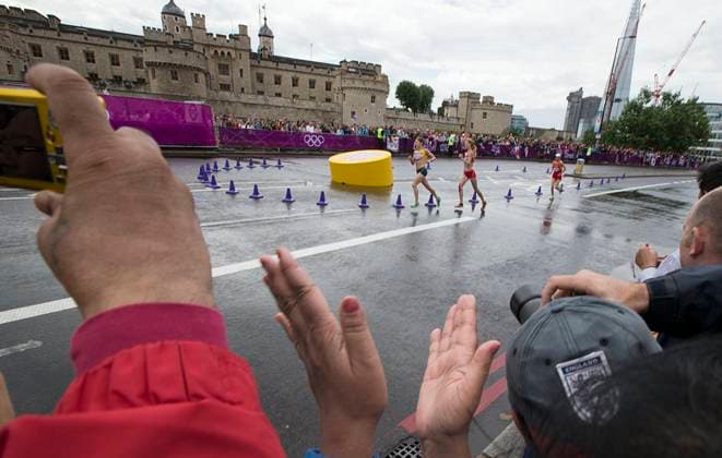 August 4, 2012 - London, England, United Kingdom - The Olympic Marathon passes through the streets of London amid rain in front of the London Tower castle. Copyright: xDanxAndersonx