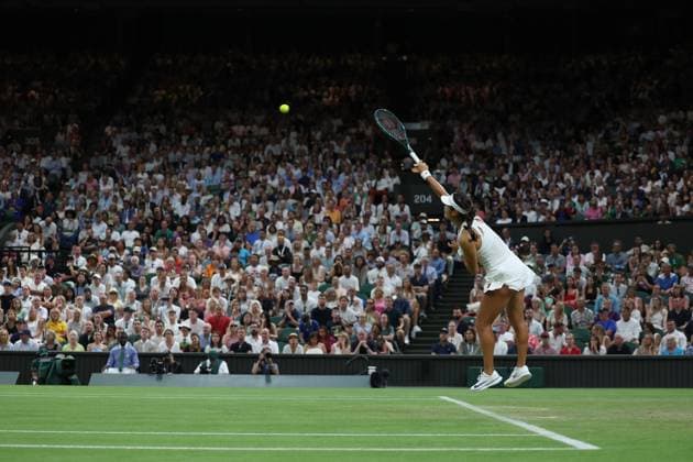 4th July 2025; All England Lawn Tennis and Croquet Club, London, England; Wimbledon Tennis Tournament, Day 5; Emma Raducanu (GBR) serves to Aryna Sabalenka (BLR)  ActionPlus12809202 JohnxPatrickxFletcher