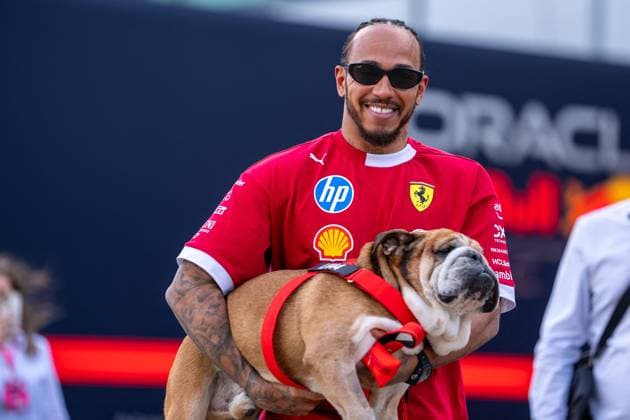F1 British Grand Prix - UK Lewis Hamilton (Gbr) of Scuderia Ferrari 44 and Roscoe Hamilton (dog) during the Formula 1 Qatar Airways British Grand Prix 2025 on Friday at the Silverstone International Circuit, Silverstone, Great Britain on July 4, 2025 Credit: Photo by Antoine Lapeyre ABACAPRESS.COM Silverstone United Kingdom  Copyright: xLapeyrexAntoine ABACAx
