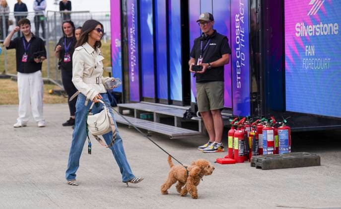 FORMULA 1 BRITISH GRAND PRIX 2025 Francisca Kika Cerqueira Gomes with Pierre Gasly 10 (FRA), Alpine A525 dog arrives in the paddock during the FORMULA 1 QATAR AIRWAYS BRITISH GRAND PRIX 2025 at the Silverstone Circuit, Silverstone, England, United Kingdom on 5 July 2025 Credit: Robbie Hoad Every Second Media Editorial use only. All images are copyright Every Second Media Limited. No images may be reproduced without prior permission. Copyright: xIMAGO EveryxSecondxMediax ESM-1519-0029 RobbiexHoadx xEveryxSecondxMediax