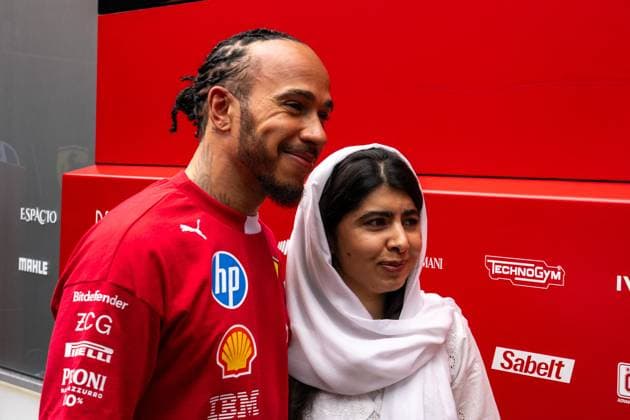 F1 British GP 2025 - UK Lewis Hamilton (Gbr) of Scuderia Ferrari 44 and Activist Malala Yousafzai (Pak) during the Formula 1 Qatar Airways British Grand Prix 2025 on Saturday at the Silverstone International Circuit, Silverstone, Great Britain on July 5, 2025 Photo by Photo by Antoine Lapeyre ABACAPRESS.COM Silverstone United Kingdom  Copyright: xLapeyrexAntoine ABACAx