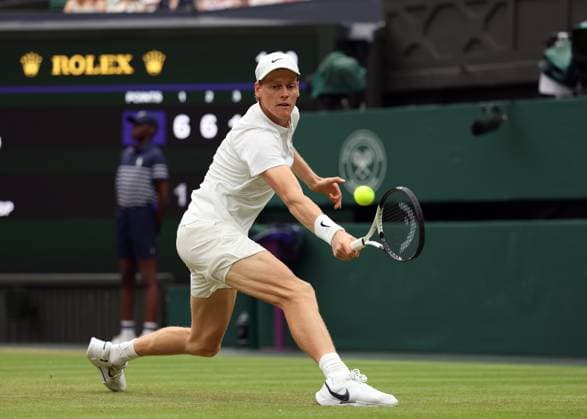 5th July 2025; All England Lawn Tennis and Croquet Club, London, England; Wimbledon Tennis Tournament, Day 6; Jannik Sinner (ITA) with a backhand shot to Pedro Martinez (ESP)  ActionPlus12809689 JohnxPatrickxFletcher