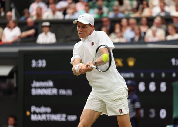 5th July 2025; All England Lawn Tennis and Croquet Club, London, England; Wimbledon Tennis Tournament, Day 6; Jannik Sinner (ITA) with a backhand shot to Pedro Martinez (ESP)  ActionPlus12809696 JohnxPatrickxFletcher