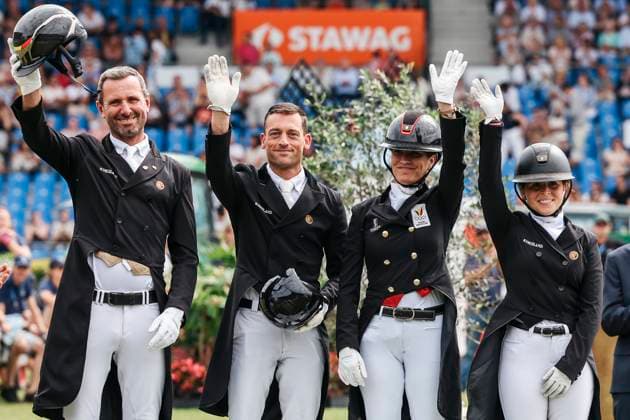 CHIO Aachen 2025 05 07 2025 Domien Michiels, Justin Verboomen, Larissa Pauluis and Charlotte Defalque at the prize-giving ceremony for the team classification of the Lambertz Nations Cup on 05 07 2025 at the CHIO Aachen 2025 on the CHIO grounds Copyright: xBEAUTIFULxSPORTS Freisenx