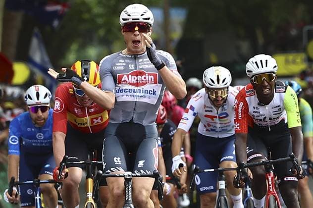 Belgian Jasper Philipsen of Alpecin-Deceuninck celebrates after winning the first stage, Lille Metropole to Lille Metropole (185 km), of the 2025 Tour de France cycling race, in Lille, France, on Saturday 05 July 2025. The 112th edition of the Tour de France starts on Saturday 5 July in Lille, France, and will finish in Paris, France on the 27th of July. DAVIDxPINTENS  x128487361x