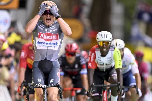 Belgian Jasper Philipsen of Alpecin-Deceuninck celebrates after winning the first stage, Lille Metropole to Lille Metropole (185 km), of the 2025 Tour de France cycling race, in Lille, France, on Saturday 05 July 2025. The 112th edition of the Tour de France starts on Saturday 5 July in Lille, France, and will finish in Paris, France on the 27th of July. JASPERxJACOBS  x128488957x