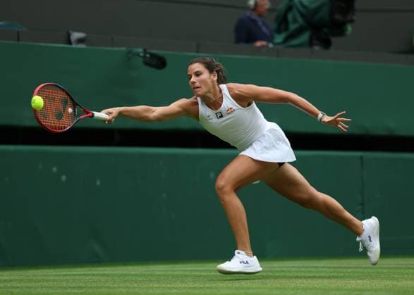 5th July 2025; All England Lawn Tennis and Croquet Club, London, England; Wimbledon Tennis Tournament, Day 6; Emma Navarro (USA) with a forehand shot to Barbora Krejcikova (CZE)  ActionPlus12809913 JohnxPatrickxFletcher
