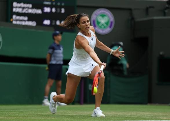5th July 2025; All England Lawn Tennis and Croquet Club, London, England; Wimbledon Tennis Tournament, Day 6; Emma Navarro (USA) with a forehand shot to Barbora Krejcikova (CZE)  ActionPlus12809917 JohnxPatrickxFletcher