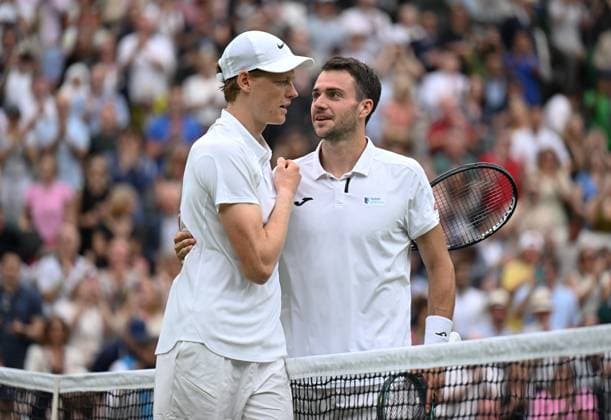 Day Six: The Championships - Wimbledon 2025 LONDON, ENGLAND - JULY 05: Jannik Sinner of Italy is congratulated by Pedro Martinez of Spain at the net following the Gentlemen s Singles third round match on day six of The Championships Wimbledon 2025 at All England Lawn Tennis and Croquet Club on July 05, 2025 in London, England. London All England Lawn Tennis and Croq England United Kingdom Copyright: xVisionhausx 776301258
