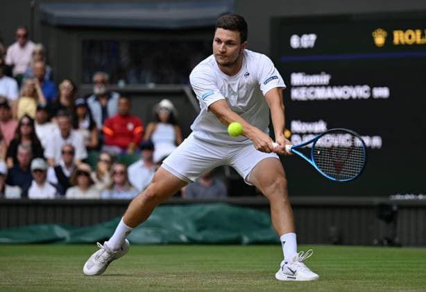 Day Six: The Championships - Wimbledon 2025 LONDON, ENGLAND - JULY 05: Miomir Kecmanovic of Serbia in action against Novak Djokovic of Serbia during the Gentlemen s Singles third round match on day six of The Championships Wimbledon 2025 at All England Lawn Tennis and Croquet Club on July 05, 2025 in London, England. London All England Lawn Tennis and Croq England United Kingdom Copyright: xVisionhausx 776301258