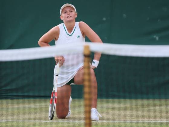 Belgian Jeline Vandromme reacts during a tennis match against Spanish Torner-Sensano, in the first round of the girls singles at the 2025 Wimbledon grand slam tournament, Saturday 05 July 2025 at the All England Tennis Club, in South-West London, Britain. BENOITxDOPPAGNE  x128501211x