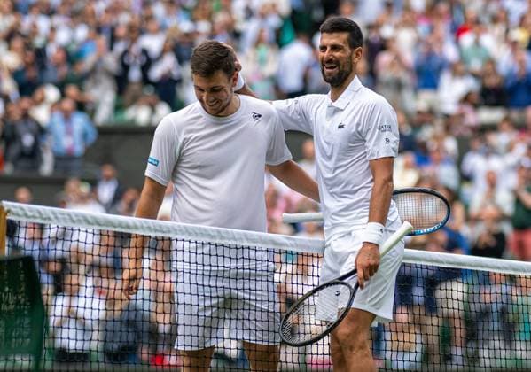 Tennis - Wimbledon Championship 2025 - Day 6 LONDON, ENGLAND - Saturday, July 5, 2025: Novak Djokovic (SRB) (R) shakes hands with Miomir Kecmanovic (SRB) after winning the Gentlemen s Singles 3rd Round on Day Six of The Championships Wimbledon 2025 at the All England Lawn Tennis and Croquet Club. Djokovic won 6-3, 6-0, 6-4. (Photo by Kirsten Holst Propaganda) LONDON All England Lawn Tennis and Croquet Club GREATER LONDON ENGLAND  Copyright: xKirstenxHolstx 2025-07-05-106-Wimbledon_2025_Day_6