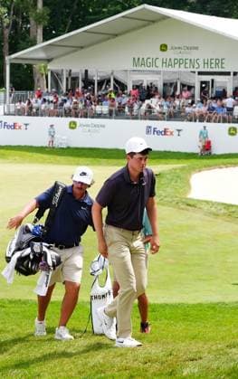 SILVIS, IL - JULY 05: PGA, Golf Herren golfer Davis Thompson walks off the 18th green leading the field by one stroke during the third round of the John Deere Classic on July 5, 2025, at TPC Deere Run in Silvis, Illinois. (Photo by Brian Spurlock Icon Sportswire) GOLF: JUL 05 PGA John Deere Classic EDITORIAL USE ONLY Icon25070521