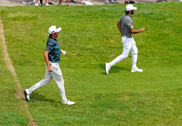 SILVIS, IL - JULY 05: From left to right PGA, Golf Herren golfers David Lipsky and Max Homa walk the 18th hole during the third round of the John Deere Classic on July 5, 2025, at TPC Deere Run in Silvis, Illinois. (Photo by Brian Spurlock Icon Sportswire) GOLF: JUL 05 PGA John Deere Classic EDITORIAL USE ONLY Icon25070527