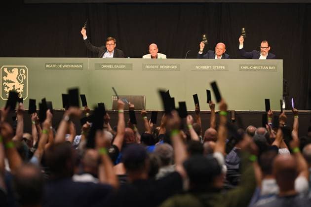 Panel with from left Daniel BAUER Robert REISINGER President 1860 ,Norbert STEPPE,Karl Christian BAY Voting,Voting card General Meeting TSV 1860 Munich on 06 07 2025 at Zenith,