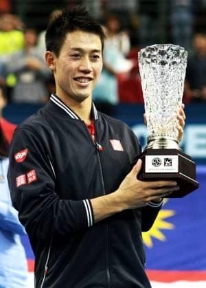 Sep 28, 2014 - Kuala Lumpur, Malaysia - KEI NISHIKORI of Japan poses with his trophy during the awarding ceremony after the final match at the Malaysian Open tennis tournament in Kuala Lumpur, Malaysia, Sunday. Copyright: xHafizxSohaimix