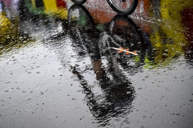 A lot of rain pictured at the start of the second stage of the 2025 Tour de France cycling race, from Lauwin-Planque to Boulogne-sur-Mer (212 km), on Sunday 06 July 2025 in France. The 112th edition of the Tour de France starts on Saturday 5 July in Lille, and will finish in Paris on the 27th of July. JASPERxJACOBS  x128531208x