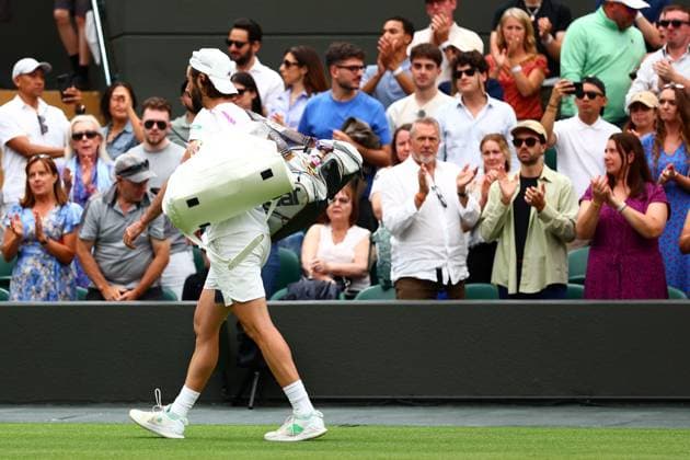 Jordan Thompson is forced to retire in his fourth round match Wimbledon Tennis Championships, Day 7, The All England Lawn Tennis and Croquet Club, London, UK - 06 Jul 2025London The All England Lawn Tennis and United Kingdom  Copyright: xJamesxMarsh Shutterstockx 15387062al