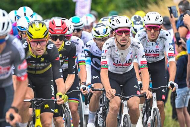 Tour de France 2025 Stage 2 BOULOGNE-SUR-MER, FRANCE - JULY 06 : Riders of UAE Team Emirates - XRG, Vingegaard Jonas (DEN) of Team Visma - Lease a Bike in the peloton during stage 2 of the 112th edition of Tour de France an UCI World Tour 2.UWT cycling road race stage for Men Elite of 212 km with start in Lauwin-Planque and finish in Boulogne-sur-Mer on July 6, 2025 in Boulogne-sur-Mer, France, 06 07 2025 ( Motordriver Kenny Verfaillie - Boulogne-sur-Mer France  Copyright: xJanxDexMeuleneirx