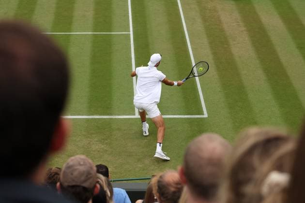 6th July 2025; All England Lawn Tennis and Croquet Club, London, England; Wimbledon Tennis Tournament, Day 7; Karen Khachanov (RUS) with a forehand shot to Kamil Majchrzak (POL)  ActionPlus12810487 JohnxPatrickxFletcher