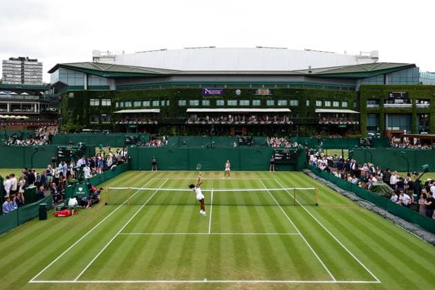 6th July 2025; All England Lawn Tennis and Croquet Club, London, England; Wimbledon Tennis Tournament, Day 7; Victoria Luiza Barros (BRA) with a forehand shot to Rositsa Dencheva (BLR) on Court 10 facing Centre Court  ActionPlus12810465 JohnxPatrickxFletcher