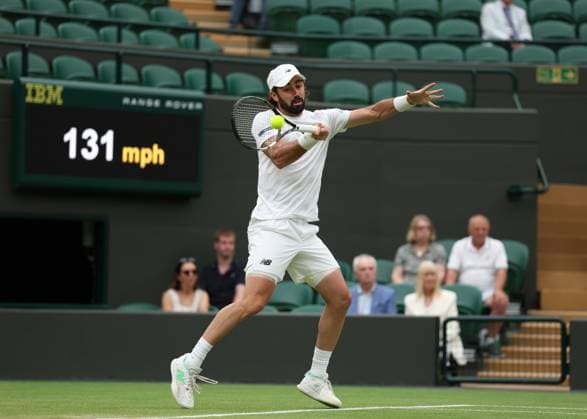 6th July 2025; All England Lawn Tennis and Croquet Club, London, England; Wimbledon Tennis Tournament, Day 7; Jordan Thompson (AUS) with a forehand shot to Taylor Fritz (USA)  ActionPlus12810481 JohnxPatrickxFletcher