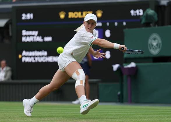6th July 2025; All England Lawn Tennis and Croquet Club, London, England; Wimbledon Tennis Tournament, Day 7; Sonay Kartal (GBR) with a backhand shot to Anastasia Pavlyuchenkova (RUS)  ActionPlus12810505 JohnxPatrickxFletcher