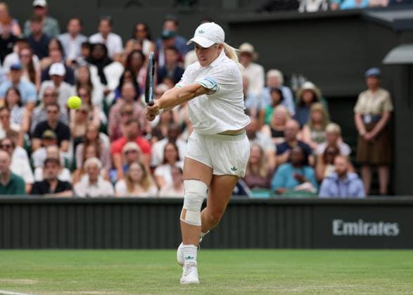 6th July 2025; All England Lawn Tennis and Croquet Club, London, England; Wimbledon Tennis Tournament, Day 7; Sonay Kartal (GBR) with a backhand shot to Anastasia Pavlyuchenkova (RUS)  ActionPlus12810508 JohnxPatrickxFletcher