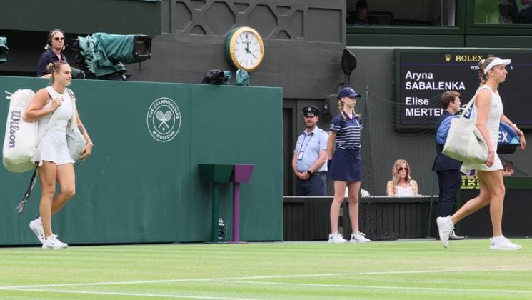 Belarussian Aryna Sabalenka and Belgian Elise Mertens pictured during a tennis match between Belgian Mertens and Belarusian Sabalenka, in the round of 16 of the women s singles at the 2025 Wimbledon grand slam tournament, Sunday 06 July 2025 at the All England Tennis Club, in South-West London, Britain. BENOITxDOPPAGNE  x128545117x