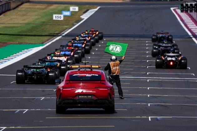 F1 - BRITISH GRAND PRIX 2025 start of the race, depart, starting grid FIA Mercedes-AMG GT 63 S 4MATIC+ Medical Car marshall, commissaire de piste, marshal, marshalls, marshals during the Formula 1 Qatar Airways British Grand Prix 2025, 12th round of the 2025 FIA Formula One World Championship, WM, Weltmeisterschaft from July 4 to 6, 2025 on the Silverstone Circuit, in Silverstone, United Kingdom - SilverstoneUnited Kingdom  Copyright: xFLORENTxGOODENx