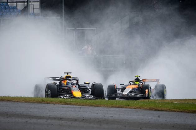 SILVERSTONE - Max Verstappen (Red Bull Racing) and Lando Norris (McLaren) in action on the Silverstone circuit for the Great Britain Grand Prix. ANP SEM VAN DER WAL xVIxANPxSportx xxANPxIVx 531034264 originalFilename: 531034264.jpg