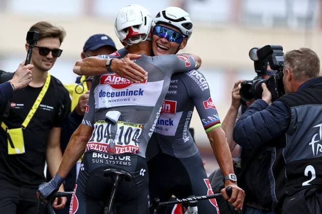 Belgian Xandro Meurisse of Alpecin-Deceuninck and Dutch Mathieu van der Poel of Alpecin-Deceuninck celebrate after winning the second stage of the 2025 Tour de France cycling race, from Lauwin-Planque to Boulogne-sur-Mer (212 km), on Sunday 06 July 2025 in France. The 112th edition of the Tour de France starts on Saturday 5 July in Lille, and will finish in Paris on the 27th of July. DAVIDxPINTENS  x128547428x