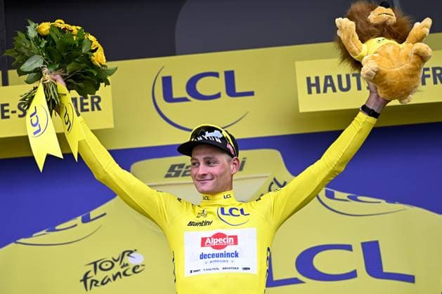 Dutch Mathieu van der Poel of Alpecin-Deceuninck celebrates on the podium in the yellow jersey of leader in the overall ranking after the second stage of the 2025 Tour de France cycling race, from Lauwin-Planque to Boulogne-sur-Mer (212 km), on Sunday 06 July 2025 in France. The 112th edition of the Tour de France starts on Saturday 5 July in Lille, and will finish in Paris on the 27th of July. DAVIDxPINTENS  x128548251x