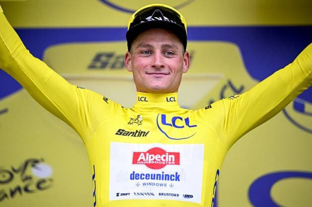 Dutch Mathieu van der Poel of Alpecin-Deceuninck celebrates on the podium in the yellow jersey of leader in the overall ranking after the second stage of the 2025 Tour de France cycling race, from Lauwin-Planque to Boulogne-sur-Mer (212 km), on Sunday 06 July 2025 in France. The 112th edition of the Tour de France starts on Saturday 5 July in Lille, and will finish in Paris on the 27th of July. DAVIDxPINTENS  x128548370x
