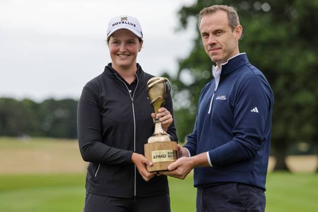 KPMG Women s Irish Open 2025, Carton House, Maynooth 6 7 2025 Lottie Woad presented with the KPMG Women s Irish Open Trophy by KPMG Managing Partner Ryan McCarthy Lottie Woad presented with the KPMG Women s Irish Open Trophy by Ryan McCarthy 6 7 2025  Copyright: x INPHO LaszloxGeczox LG1_4257