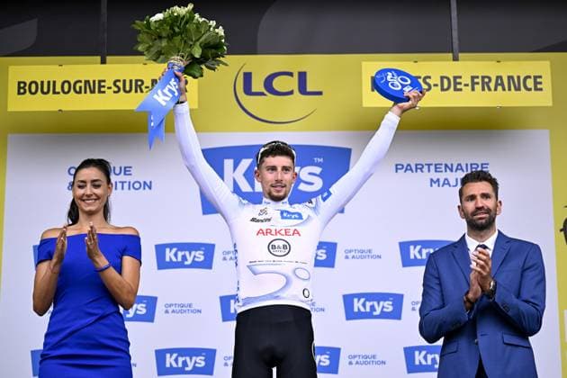 French Kevin Vauquelin of Arkea-BB Hotels celebrates on the podium in the white jersey for best young rider after the second stage of the 2025 Tour de France cycling race, from Lauwin-Planque to Boulogne-sur-Mer (212 km), on Sunday 06 July 2025 in France. The 112th edition of the Tour de France starts on Saturday 5 July in Lille, and will finish in Paris on the 27th of July. JASPERxJACOBS  x128548938x