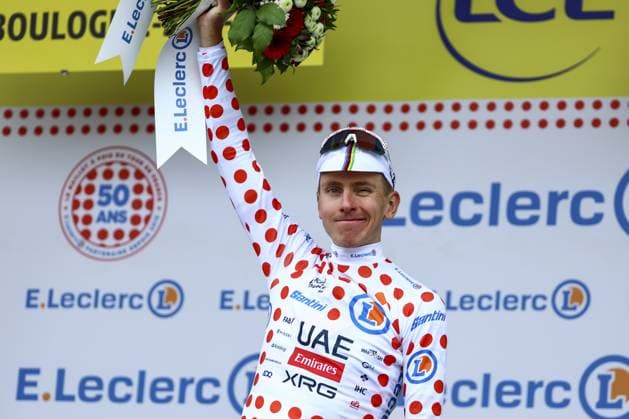 Slovenian Tadej Pogacar of UAE Team Emirates celebrates on the podium in the red polka-dot jersey for best climber after the second stage of the 2025 Tour de France cycling race, from Lauwin-Planque to Boulogne-sur-Mer (212 km), on Sunday 06 July 2025 in France. The 112th edition of the Tour de France starts on Saturday 5 July in Lille, and will finish in Paris on the 27th of July. DAVIDxPINTENS  x128549189x