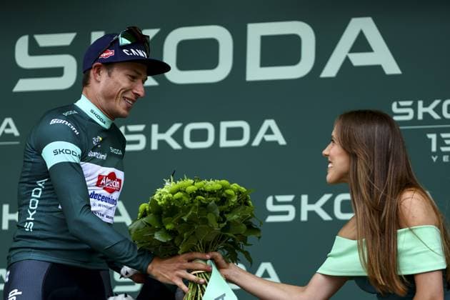 Belgian Jasper Philipsen of Alpecin-Deceuninck celebrates on the podium in the green points jersey after the second stage of the 2025 Tour de France cycling race, from Lauwin-Planque to Boulogne-sur-Mer (212 km), on Sunday 06 July 2025 in France. The 112th edition of the Tour de France starts on Saturday 5 July in Lille, and will finish in Paris on the 27th of July. DAVIDxPINTENS  x128549223x