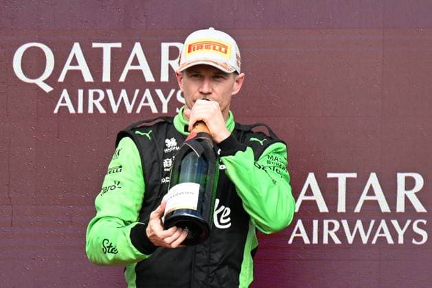 6th July 2025; Silverstone Circuit, Northamptonshire, England; Formula 1 2025 Qatar Airways British F1 Grand Prix; Race Day; Nico Hulkenberg of Kick Sauber drinks champagne on the podium after finishing third in the race  ActionPlus12810759 SimonxWest