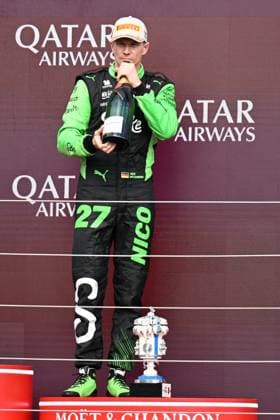 6th July 2025; Silverstone Circuit, Northamptonshire, England; Formula 1 2025 Qatar Airways British F1 Grand Prix; Race Day; Nico Hulkenberg of Kick Sauber drinks champagne on the podium after finishing third in the race  ActionPlus12810760 SimonxWest