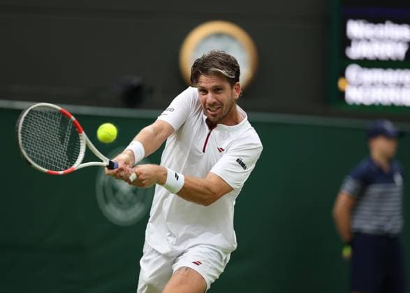 6th July 2025; All England Lawn Tennis and Croquet Club, London, England; Wimbledon Tennis Tournament, Day 7; Cameron Norrie (GBR) with a backhand shot to Nicolas Jarry (CHI)  ActionPlus12810925 JohnxPatrickxFletcher