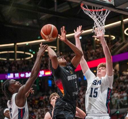 July 6, 2025, Lausanne, Vaud, Switzerland: Lausanne Switzerland, 07 06 2025: CHRISTIAN ANDERSON of Germany 3 against CALEB HOLT of USA 6 and DANIEL JACOBSEN of USA 15 during final of FIBA U19 Basketball World Cup 2025 and took place at Lausanne Arena in Lausanne. USA won 109-76. Lausanne Switzerland - ZUMAd206 20250706_zip_d206_002 Copyright: xEricxDubostx