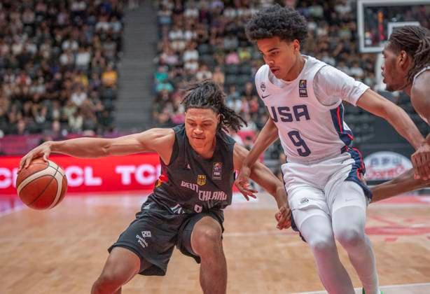 July 6, 2025, Lausanne, Vaud, Switzerland: Lausanne Switzerland, 07 06 2025: KEENAN GARMER of Germany 13 against MIKEL BROWN. JR of USA 9 during final of FIBA U19 Basketball World Cup 2025 and took place at Lausanne Arena in Lausanne..USA won 109-76. Lausanne Switzerland - ZUMAd206 20250706_zip_d206_009 Copyright: xEricxDubostx