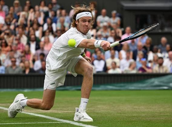 Day Seven: The Championships - Wimbledon 2025 LONDON, ENGLAND - JULY 06: Andrey Rublev in action against Carlos Alcaraz of Spain during the Gentlemen s Singles fourth round match on day seven of The Championships Wimbledon 2025 at All England Lawn Tennis and Croquet Club on July 06, 2025 in London, England. (Photo by Visionhaus via ) London All England Lawn Tennis and Croq England United Kingdom Copyright: xVisionhausx 776301259