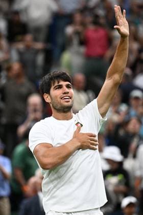 (250707) -- LONDON, July 7, 2025 -- Carlos Alcaraz celebrates after the men s singles fourth round match between Carlos Alcaraz of Spain and Andrey Rublev of Russia at the Wimbledon Tennis Championships in London, Britain, July 6, 2025. ) (SP)BRITAIN-LONDON-TENNIS-WIMBLEDON-MEN S SINGLES ZhaoxDingzhe 
