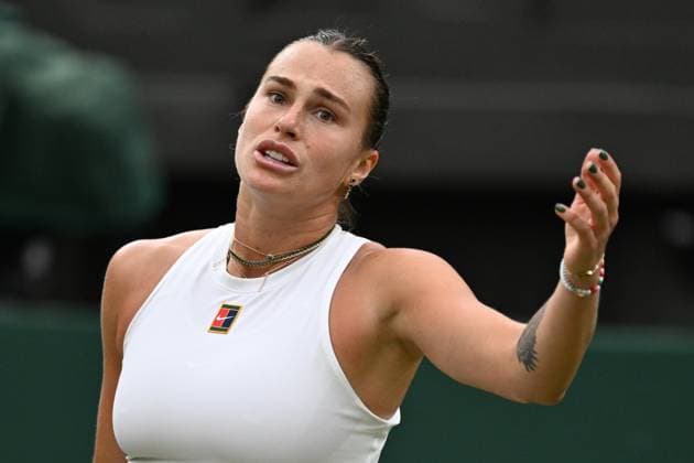 (250707) -- LONDON, July 7, 2025 -- Aryna Sabalenka reacts during the women s singles fourth round match between Aryna Sabalenka of Belarus and Elise Mertens of Belgium at the Wimbledon Tennis Championships in London, Britain, July 6, 2025. ) (SP)BRITAIN-LONDON-TENNIS-WIMBLEDON-WOMEN S SINGLES ZhaoxDingzhe 
